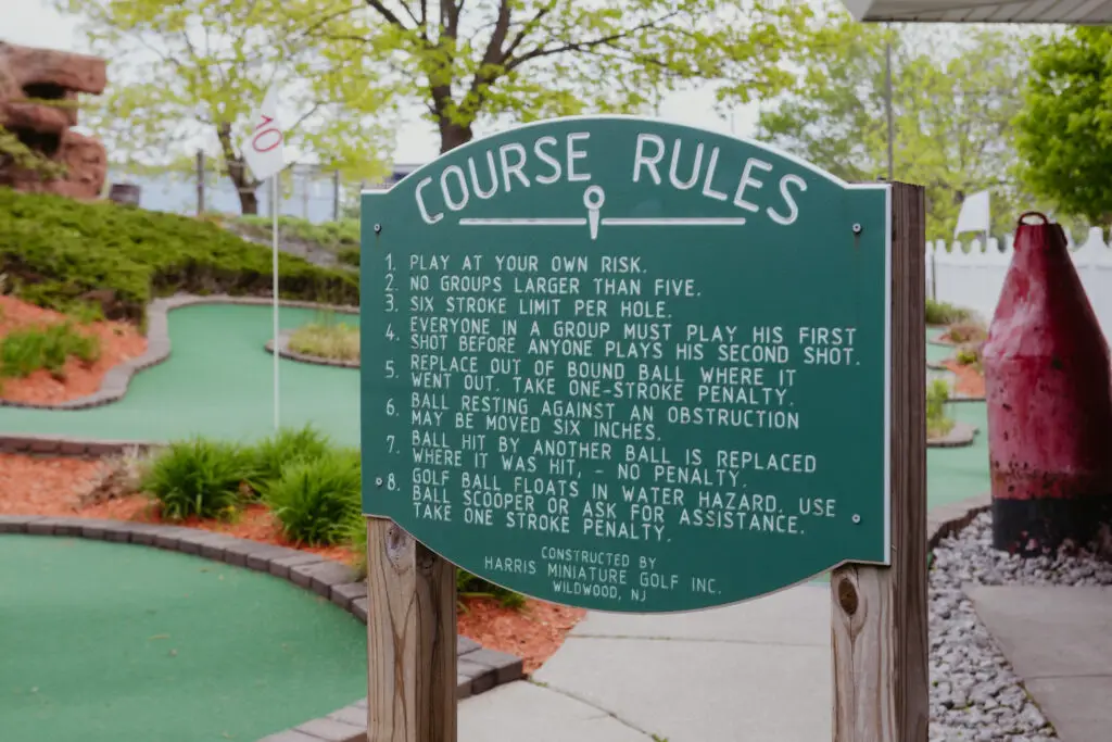 Mini golf course rules sign at the entrance to the Buoy 18 mini golf course in Bay City, Michigan.