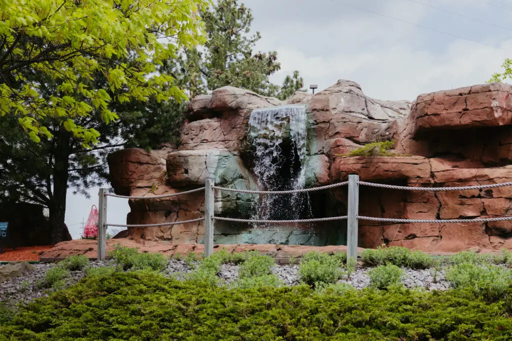 Large waterfall feature and rock formation on the Buoy 18 mini golf course in Bay City, Michigan.